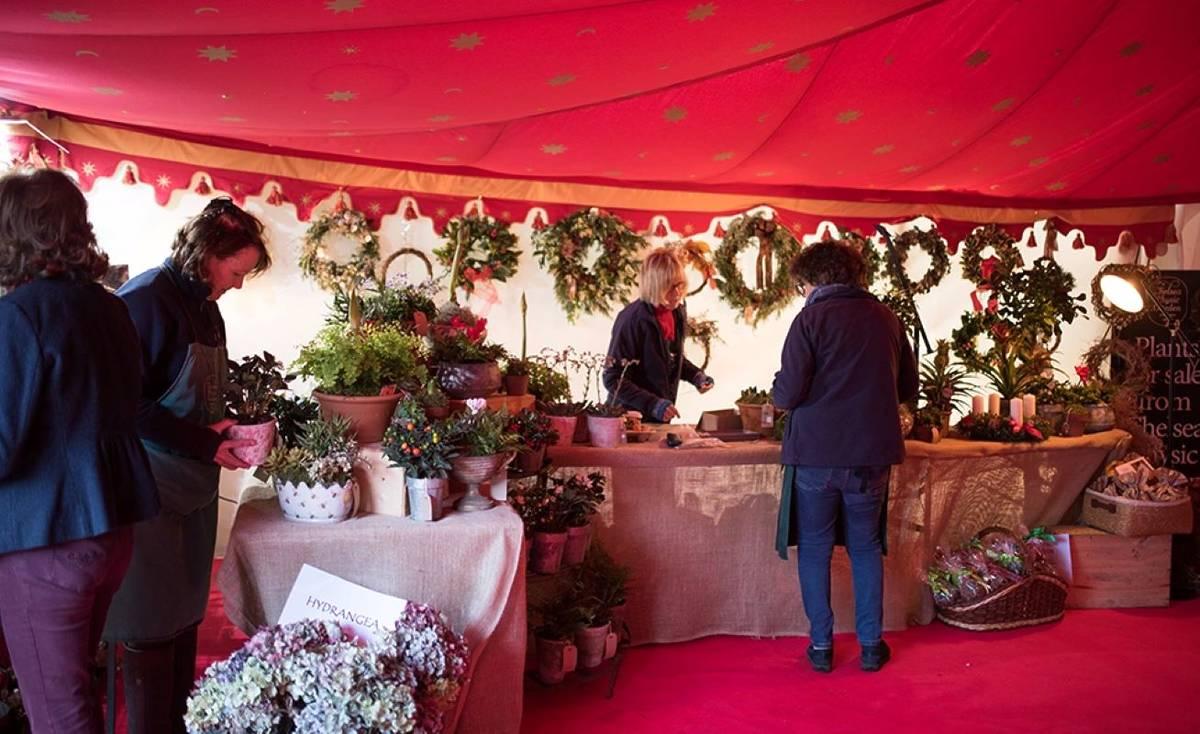 A wreath stall at Chelsea Physic Garden Christmas fair