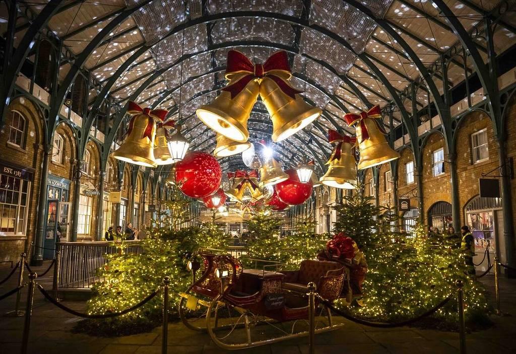 the lit up bells and christmas decorations at covent garden